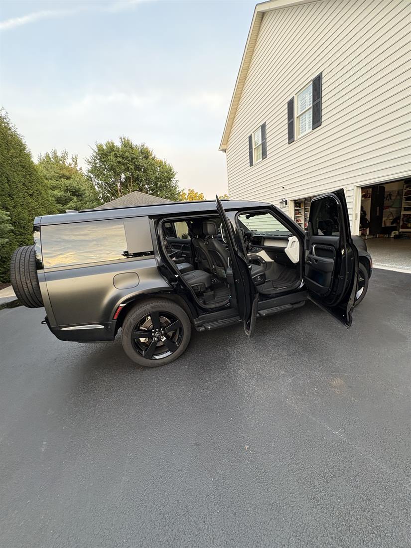 Land Rover Defender with doors open during a mobile detail