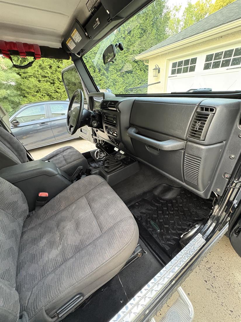 Cleaned cloth seats and interior of a Jeep Wrangler